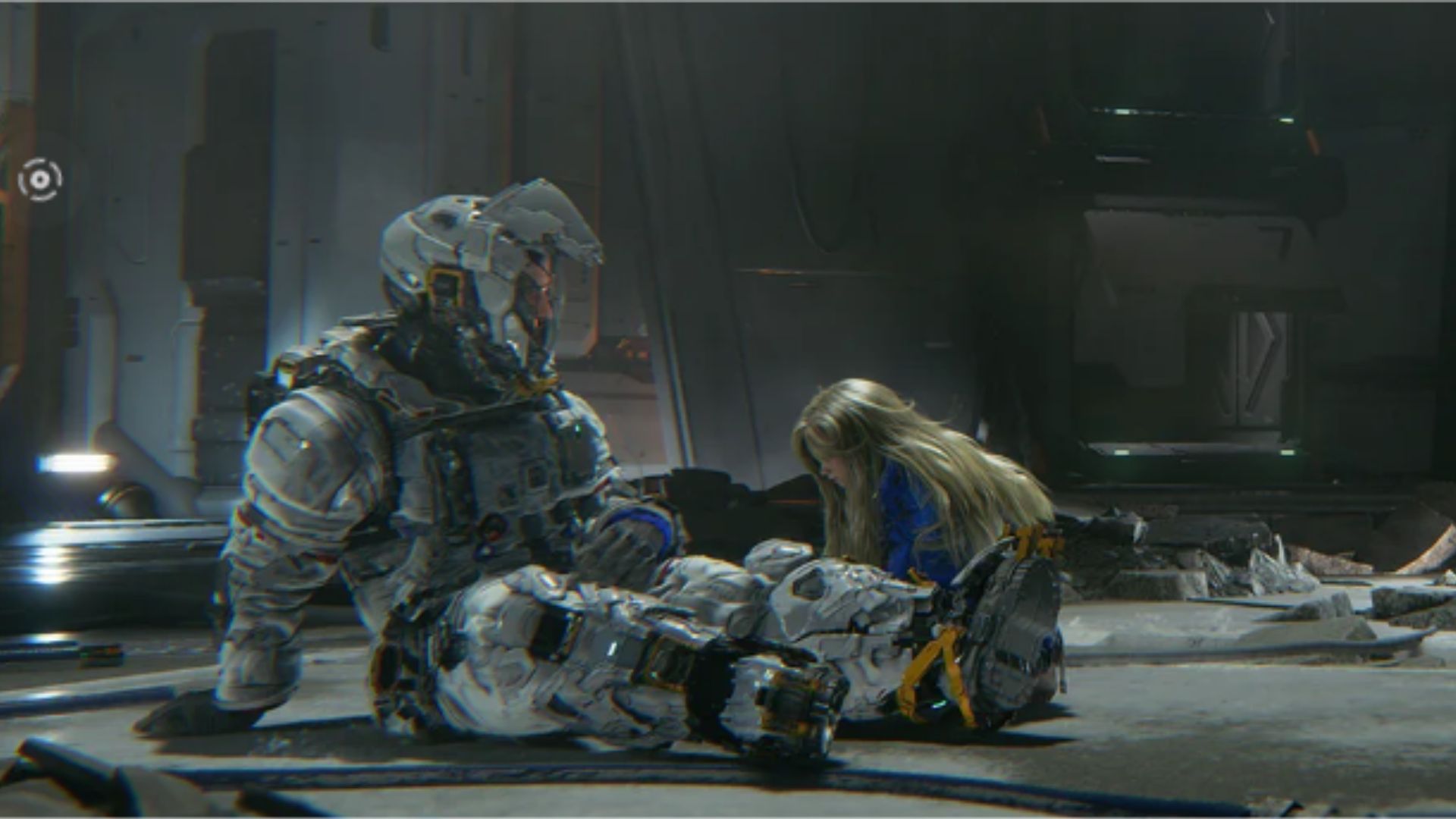In-game scene from Pragmata showing an astronaut in a damaged spacesuit sitting beside a young girl in a dim, futuristic facility.